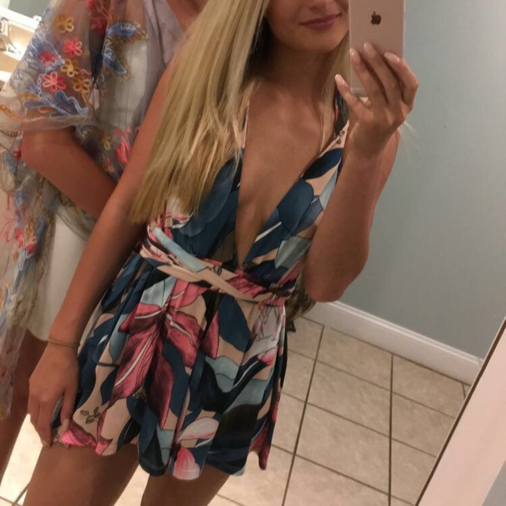 These three boutiques Floral Wrap romper